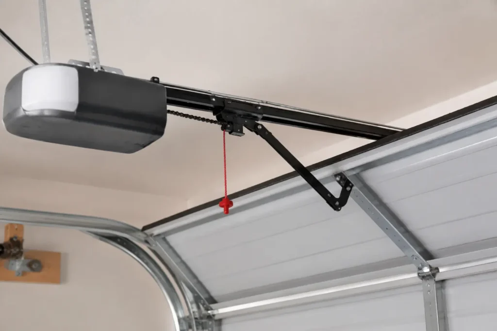 Garage opener mechanism pulling a strained garage door